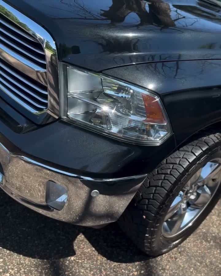 Black Ram 1500 grille and headlight after an exterior detail